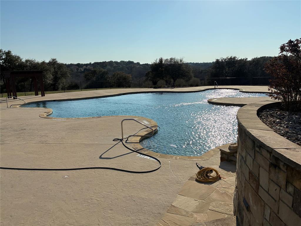 6500 Castle Royle Drive Cleburne, TX 76033 - Photo 19 of 29 a view of swimming pool in a yard