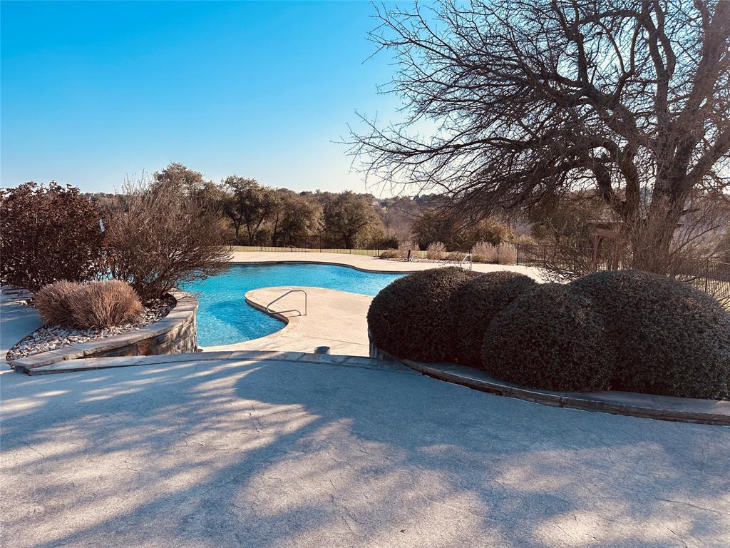 6500 Castle Royle Drive Cleburne, TX 76033 - Photo 20 of 29 a view of swimming pool with lounge chair