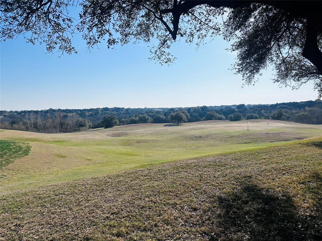 6500 Castle Royle Drive Cleburne, TX 76033 - Photo 27 of 29 a view of an ocean and beach