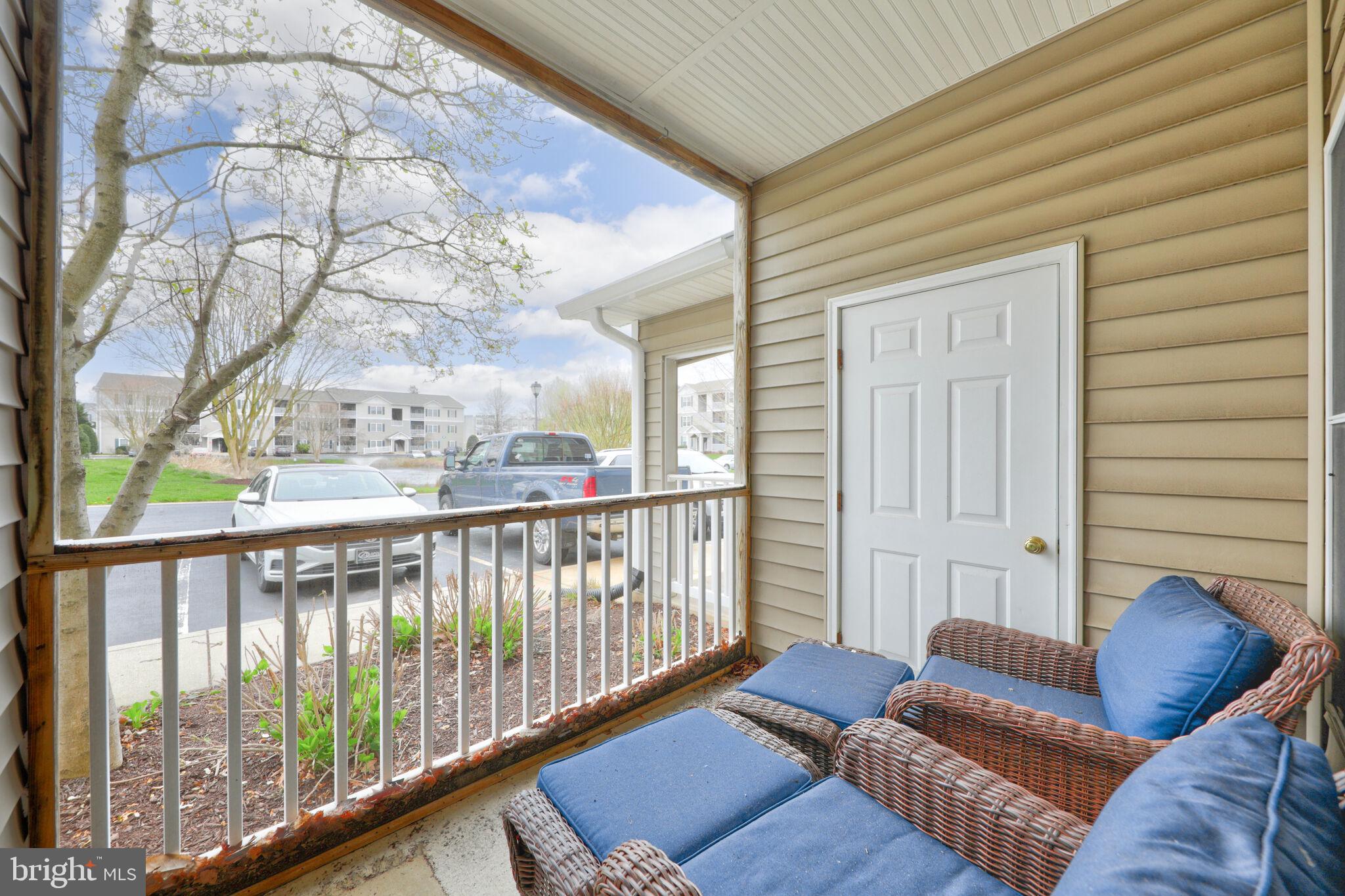 100 Cascade Lane, Unit 108 Rehoboth Beach, DE 19971 - Photo 23 of 36 Screened Porch