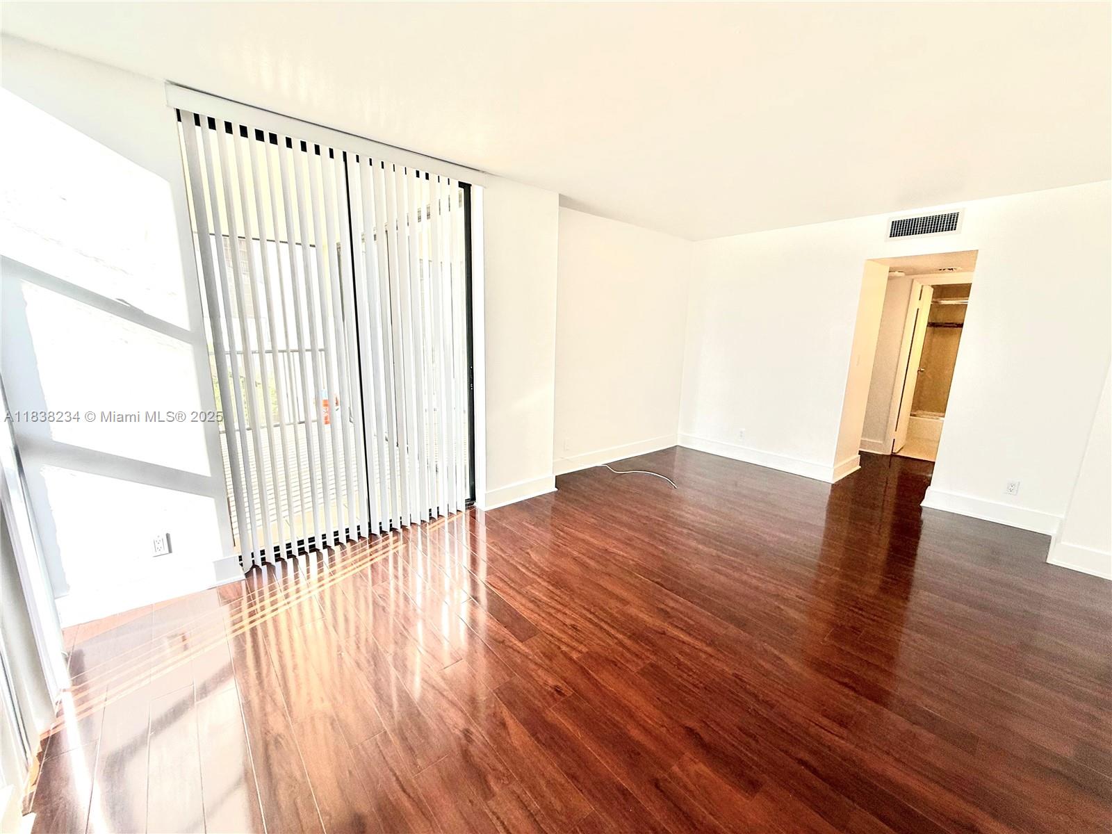 20335 West Country Club Drive, Unit 502 Aventura, FL 33180 - Photo 25 of 26 a view of entryway with wooden floor