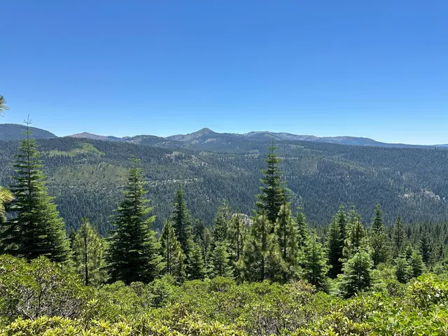a view of a lake with mountains in the background