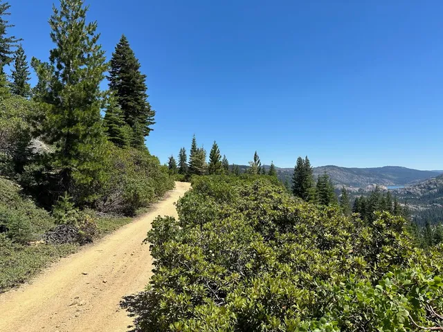 a view of a city with a mountain in the background