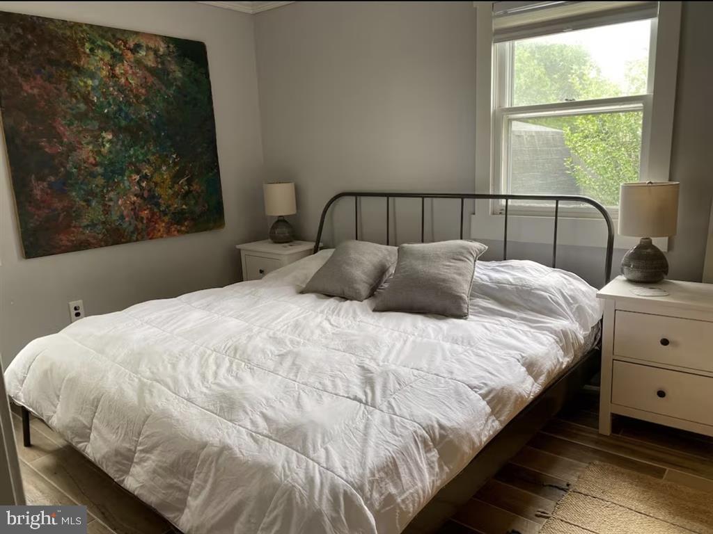 13803 Fountain Road Ocean City, MD 21842 - Photo 20 of 23 a bedroom with a bed and window