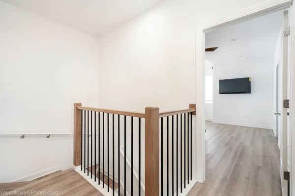 a view of a livingroom with wooden floor