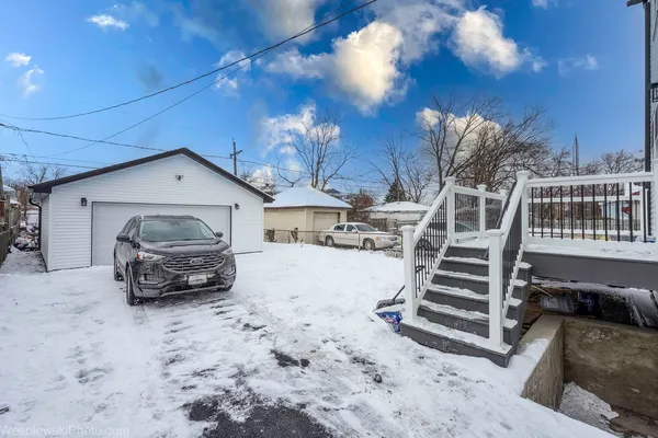 a car parked in front of a house