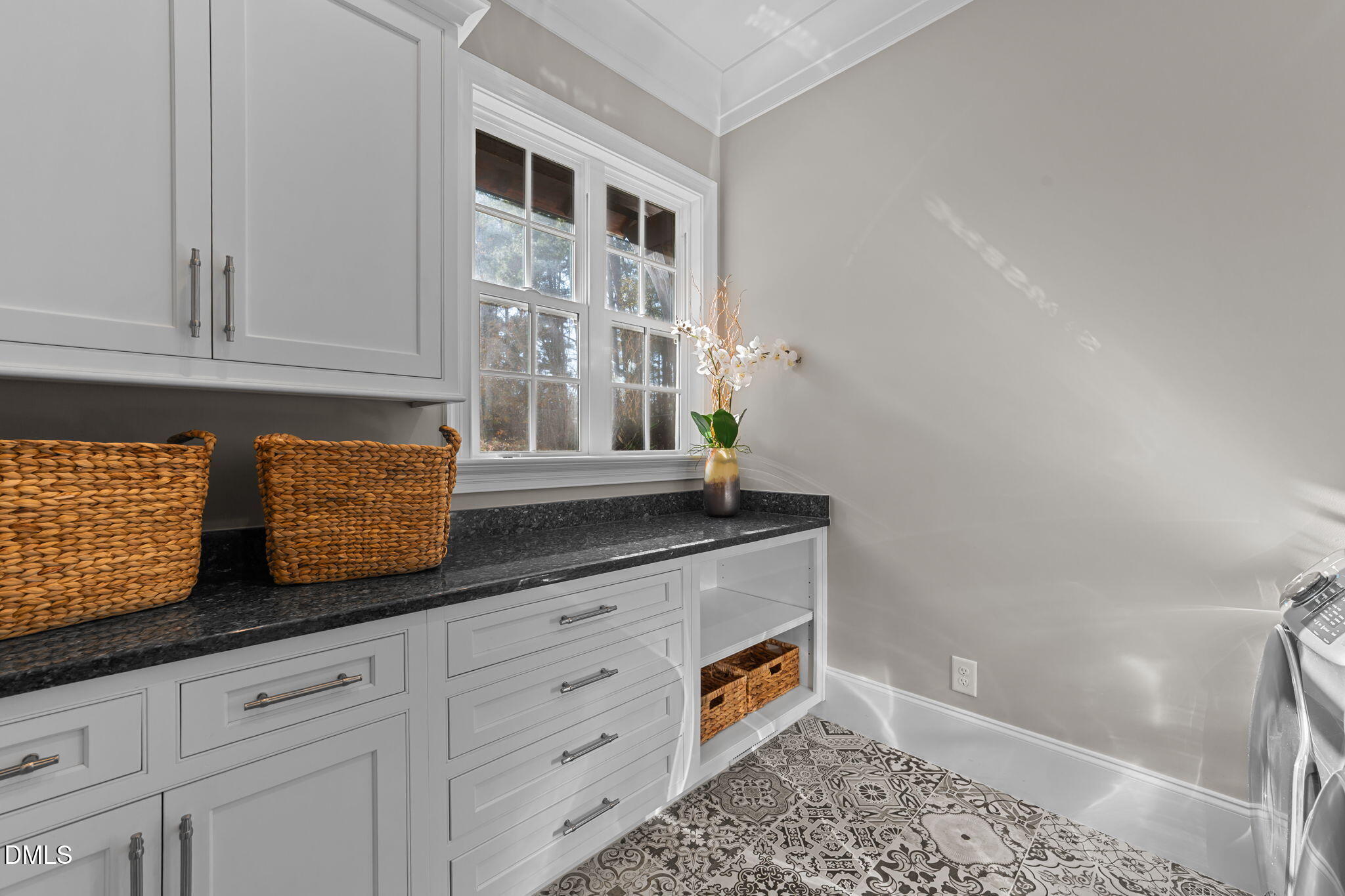2600 Oxford Road Raleigh, NC 27608 - Photo 19 of 42 a kitchen with granite countertop white cabinets and stainless steel appliances