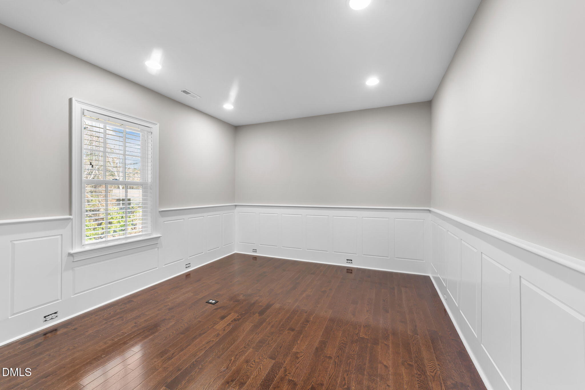 2600 Oxford Road Raleigh, NC 27608 - Photo 35 of 42 an empty room with wooden floor and windows