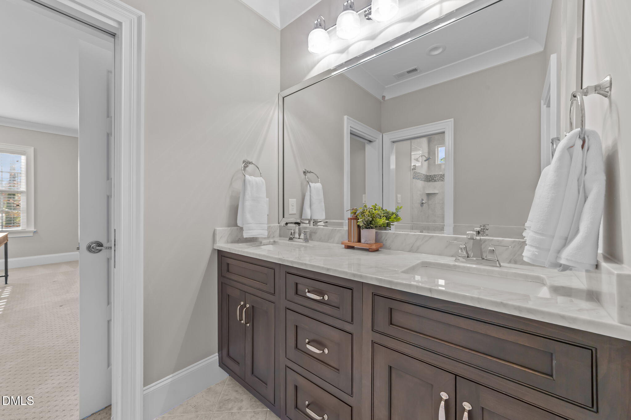 2600 Oxford Road Raleigh, NC 27608 - Photo 36 of 42 a bathroom with a granite countertop sink and a mirror