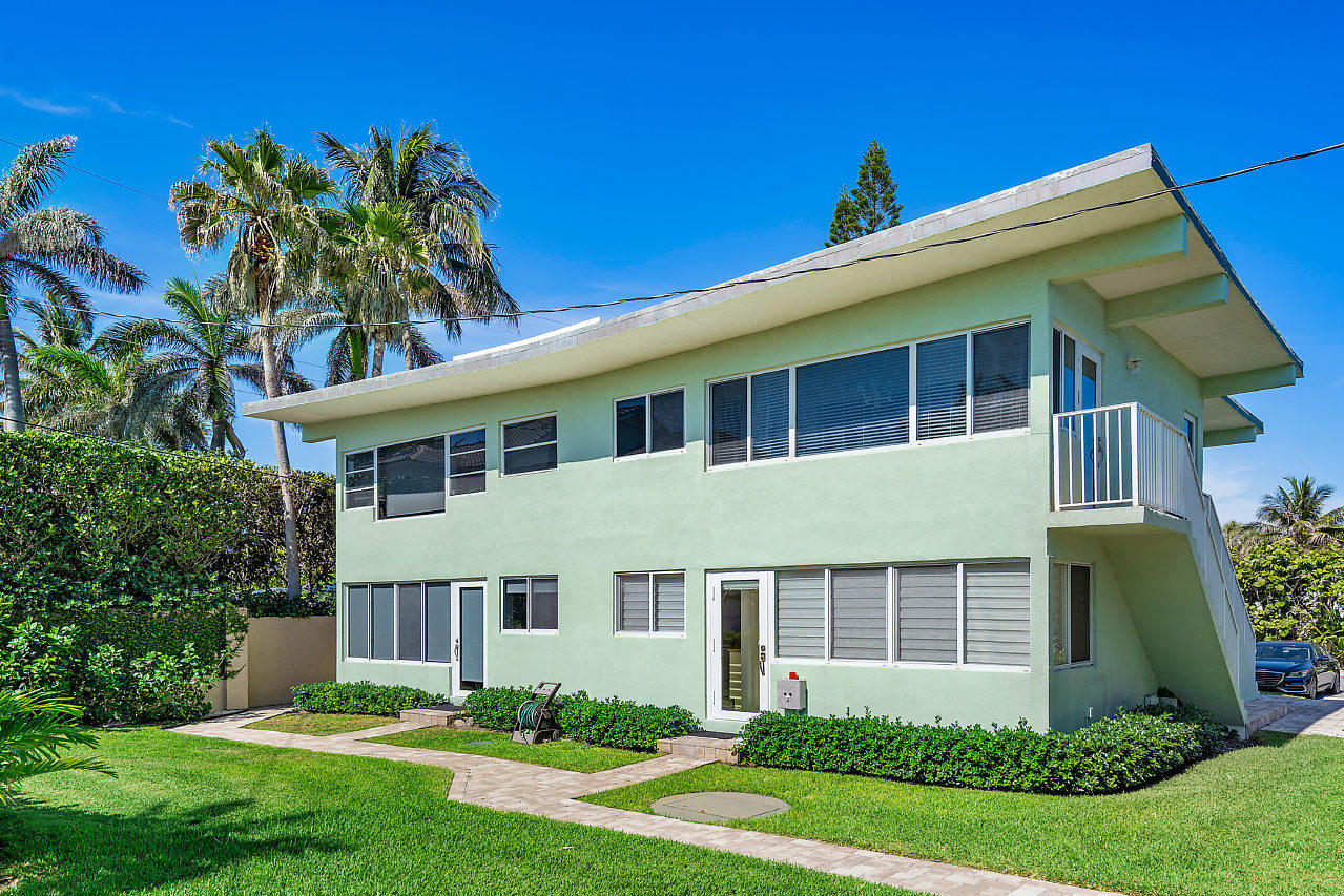 5700 Old Ocean Boulevard, Unit V Ocean Ridge, FL 33435 - Photo 1 of 24 a view of a house with a yard