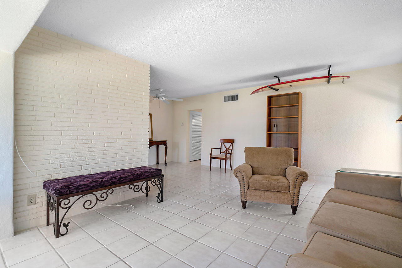 5700 Old Ocean Boulevard, Unit V Ocean Ridge, FL 33435 - Photo 12 of 24 a living room with furniture