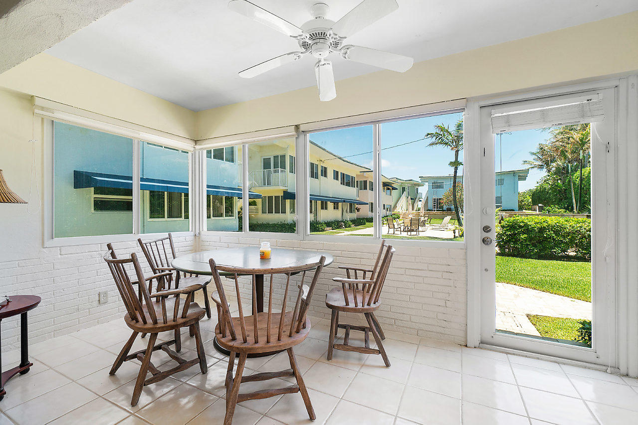 5700 Old Ocean Boulevard, Unit V Ocean Ridge, FL 33435 - Photo 18 of 24 a view of a dining room with furniture window and outside view