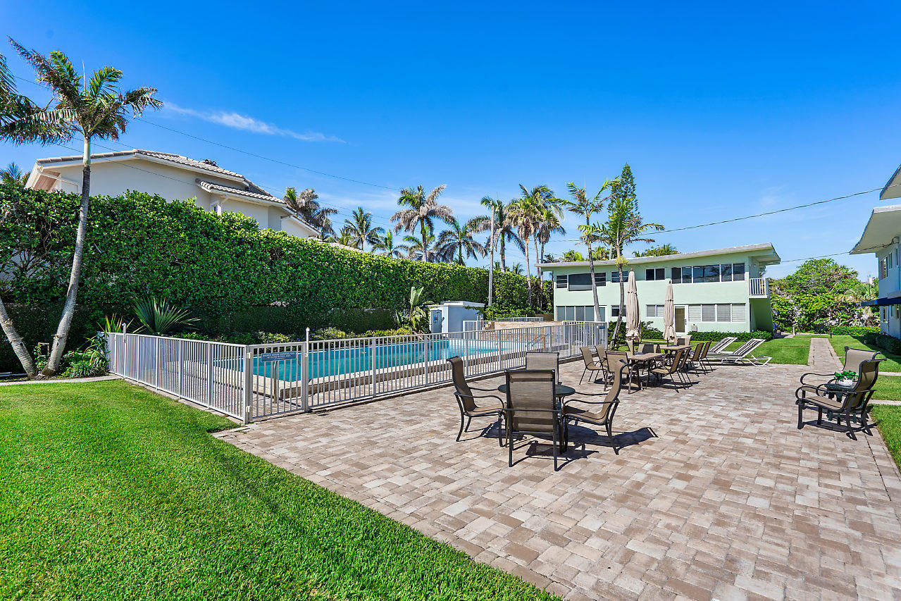 5700 Old Ocean Boulevard, Unit V Ocean Ridge, FL 33435 - Photo 7 of 24 a view of a backyard with sitting area