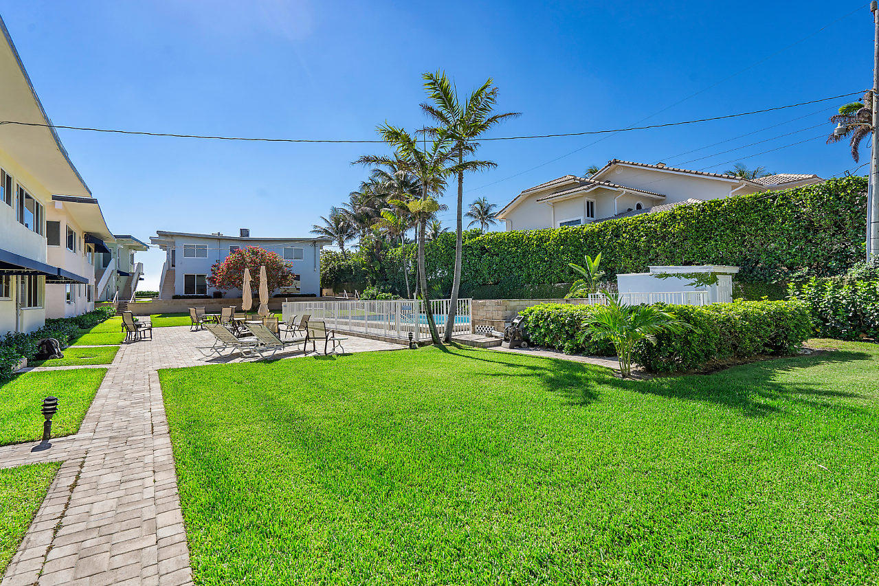 5700 Old Ocean Boulevard, Unit V Ocean Ridge, FL 33435 - Photo 8 of 24 a garden view with a seating space