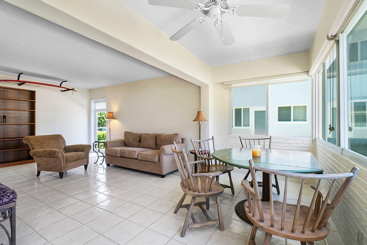 5700 Old Ocean Boulevard, Unit V Ocean Ridge, FL 33435 - Photo 10 of 24 a living room with furniture and a window