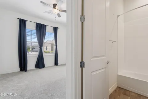 a kitchen with a stove and a refrigerator