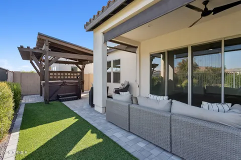 a view of a white house with a outdoor space