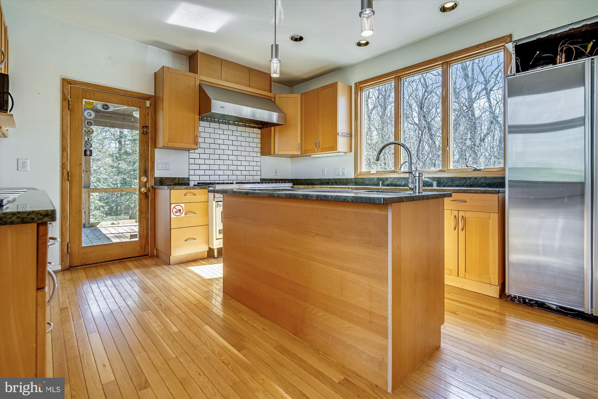 2751 Colonial Road Accokeek, MD 20607 - Photo 16 of 49 Center island with prep sink