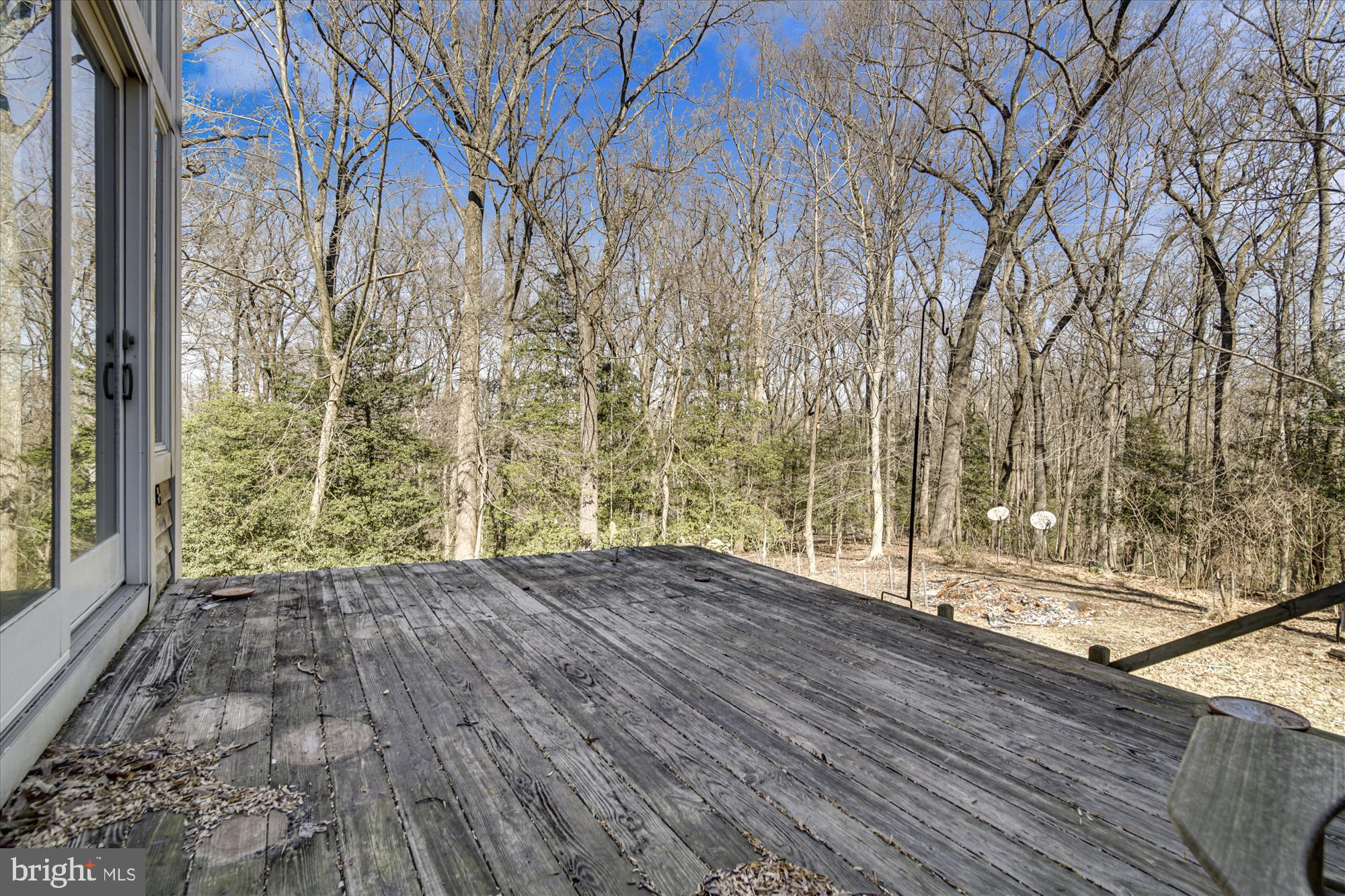 Screened porch opens to deck