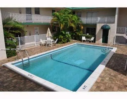 a view of a house with a swimming pool