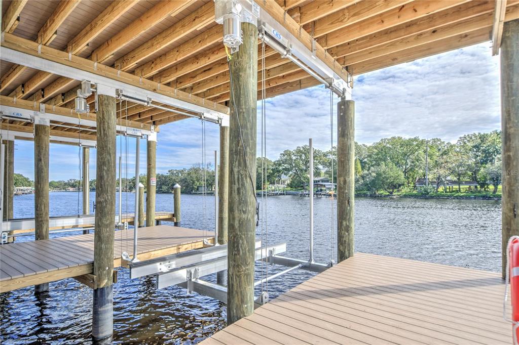 4033 North River View Avenue Tampa, FL 33607 - Photo 11 of 66 a bedroom with a bed and wooden floor