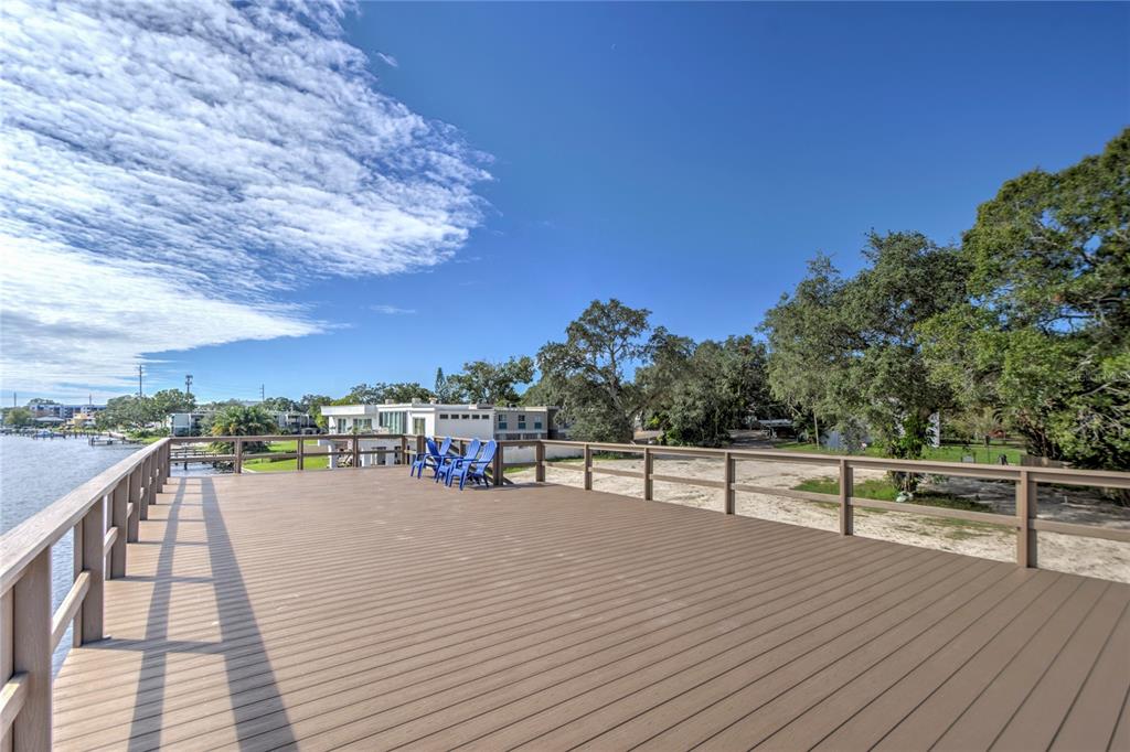 4033 North River View Avenue Tampa, FL 33607 - Photo 14 of 66 a view of a terrace with trees