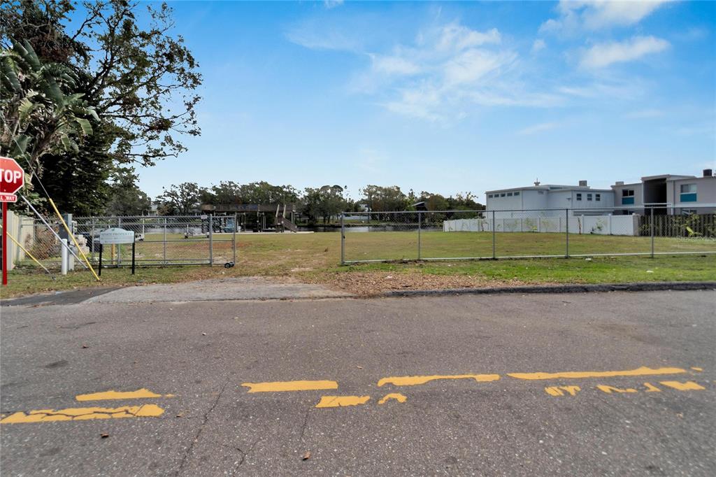 4033 North River View Avenue Tampa, FL 33607 - Photo 20 of 66 a view of a lake view with a big yard
