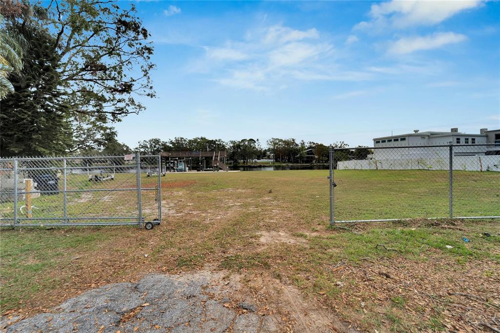 4033 North River View Avenue Tampa, FL 33607 - Photo 21 of 66 a view of a lake with houses in the back