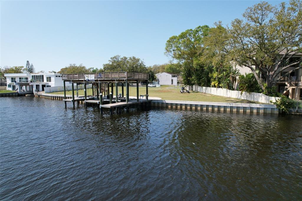 4033 North River View Avenue Tampa, FL 33607 - Photo 54 of 66 a view of swimming pool with outdoor seating and yard