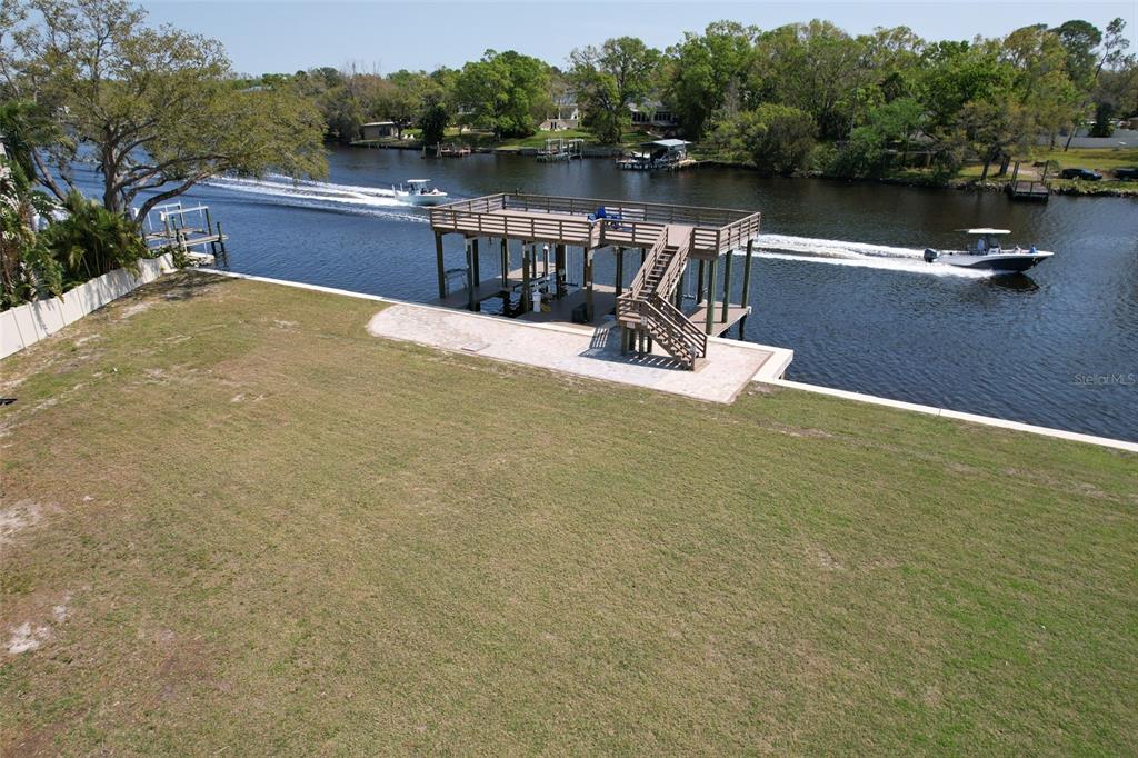 4033 North River View Avenue Tampa, FL 33607 - Photo 57 of 66 a view of a lake with couches in the background