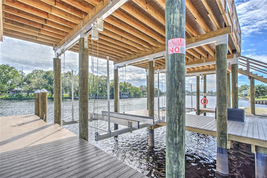 4033 North River View Avenue Tampa, FL 33607 - Photo 10 of 66 a view of a patio with a table and chairs
