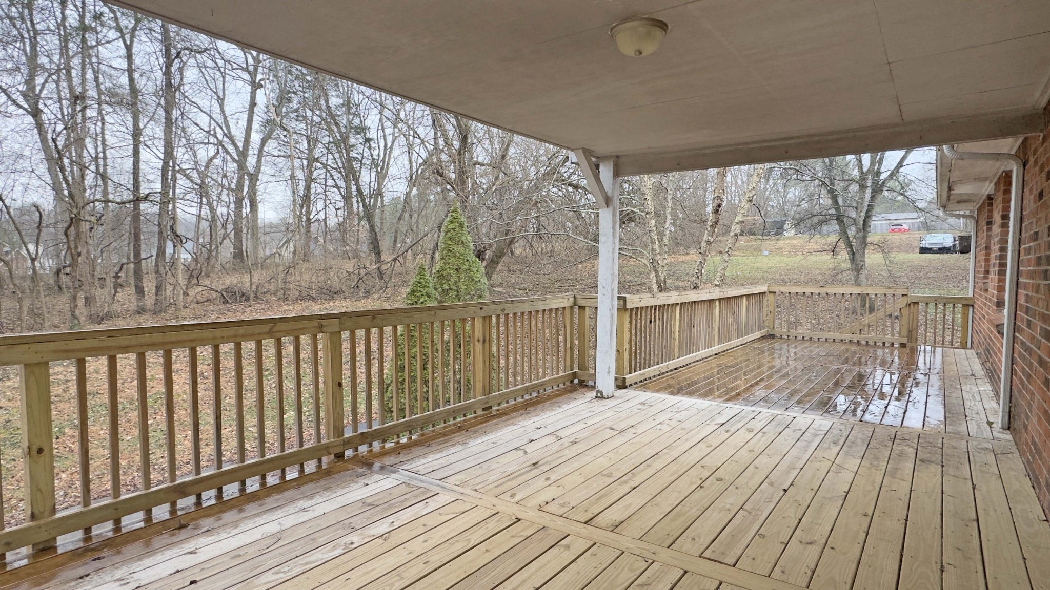 328 Dunbar Cave Road Clarksville, TN 37043 - Photo 26 of 26 a view of a room with wooden floor and iron stairs