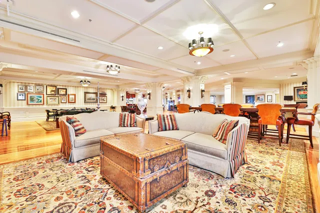 a city street lined with buildings and cars