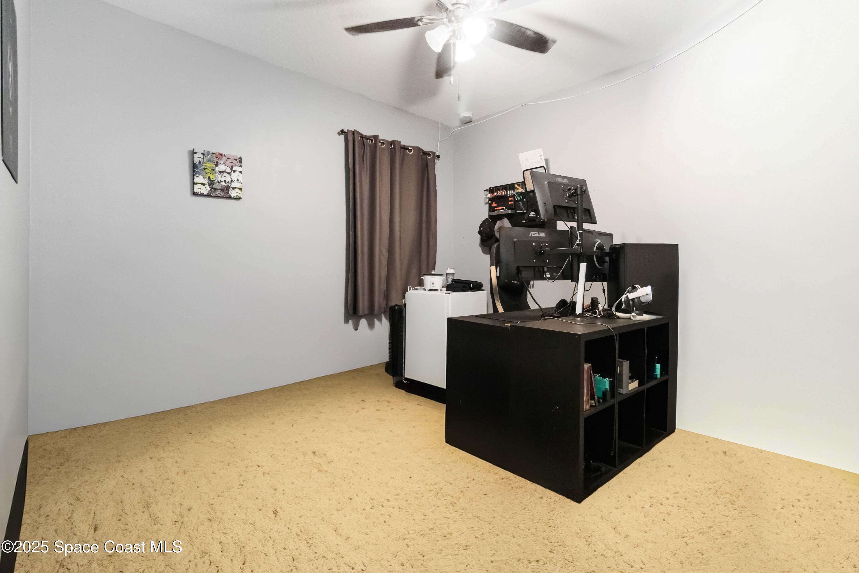 1070 Swiss Pointe Lane Rockledge, FL 32955 - Photo 17 of 29 a view of workspace with furniture