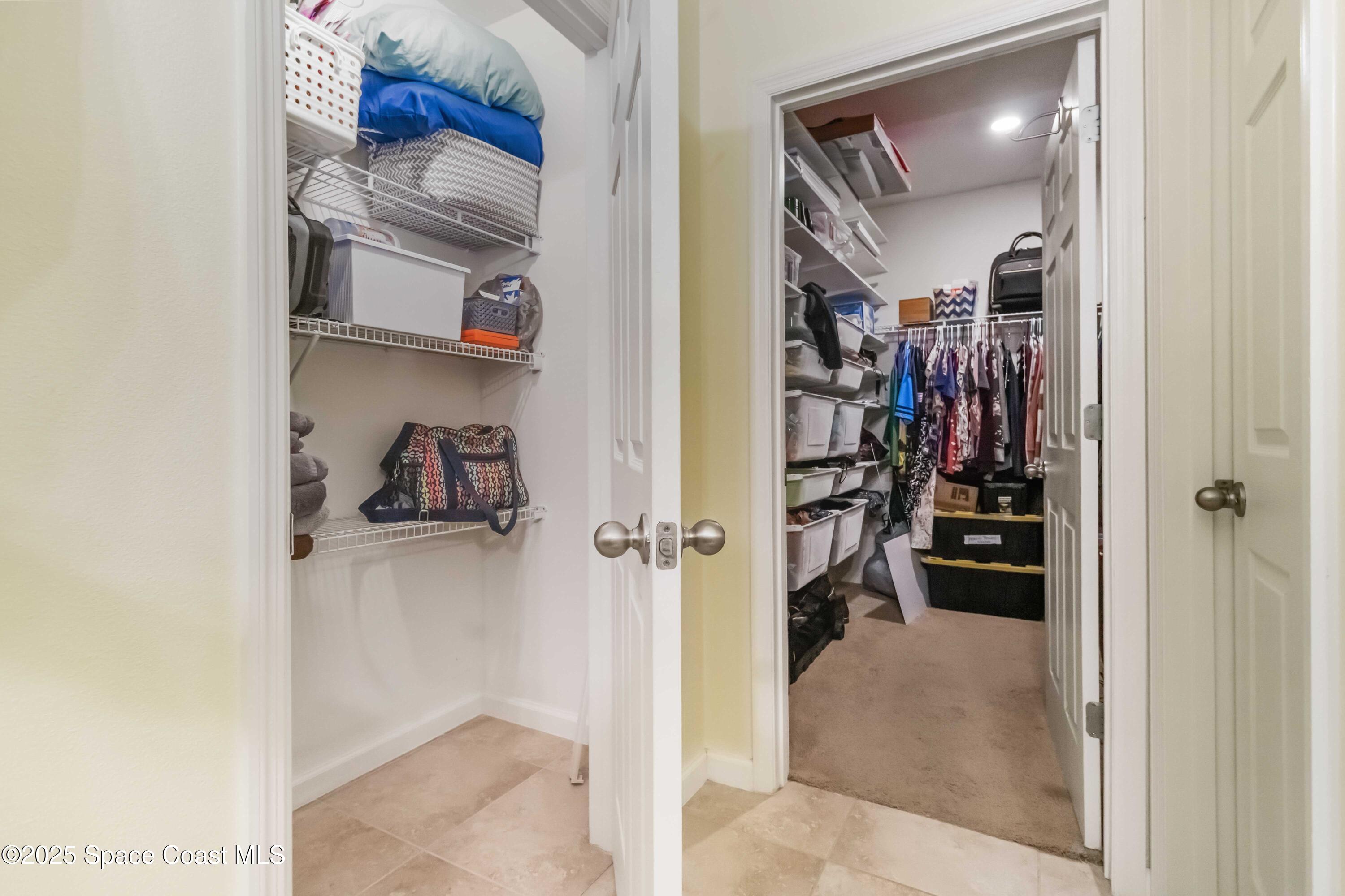 1070 Swiss Pointe Lane Rockledge, FL 32955 - Photo 23 of 29 a view of walk in closet with clothes and shoes