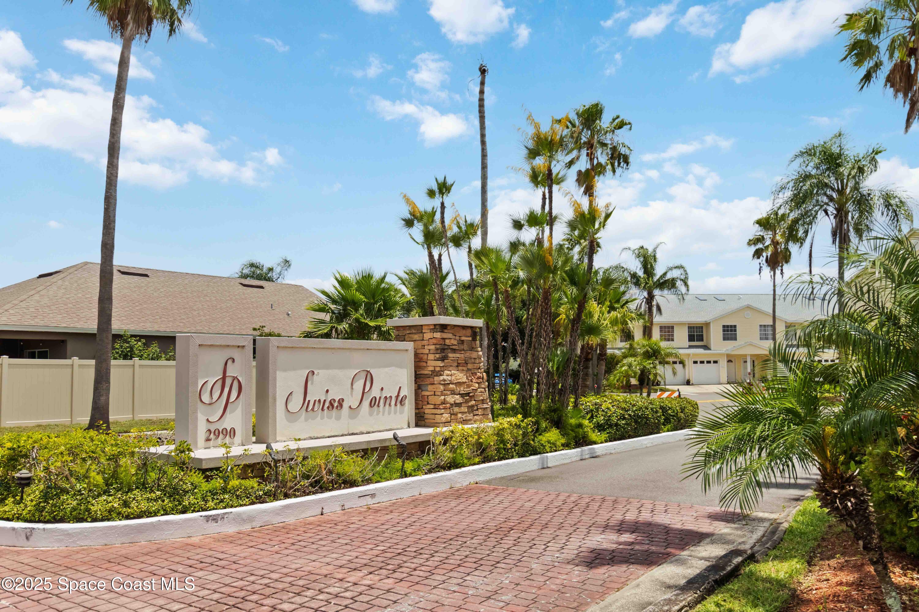 1070 Swiss Pointe Lane Rockledge, FL 32955 - Photo 29 of 29 a sign that is on the side of a road