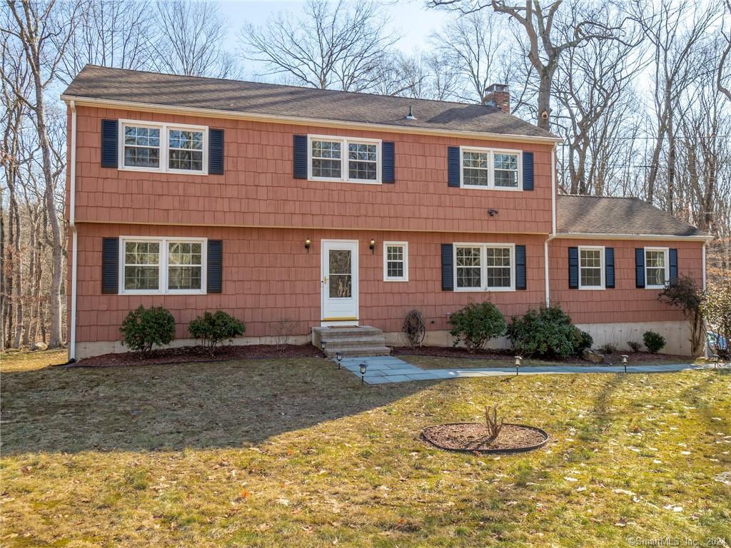 a front view of a house with swimming pool