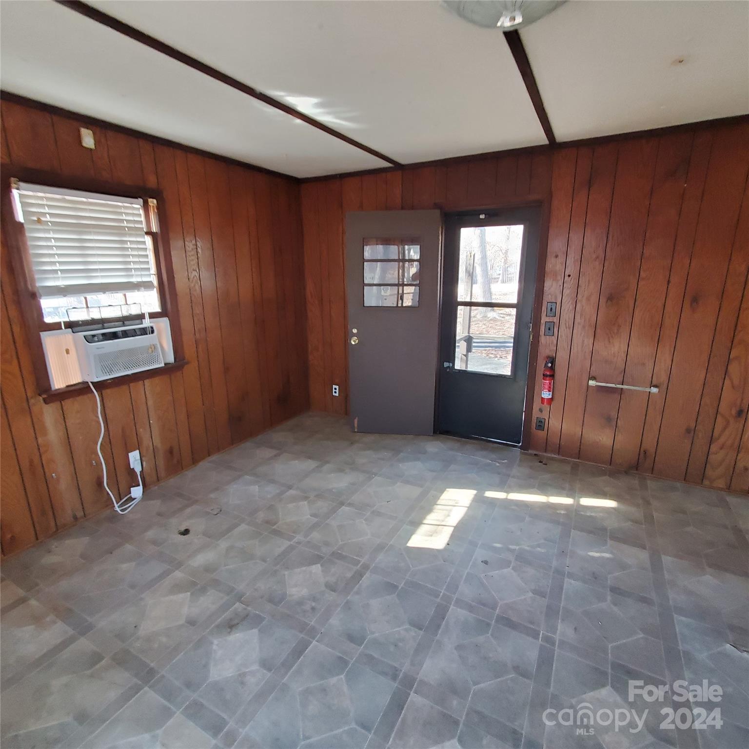 135 Printhad Road Dallas, NC 28034 - Photo 11 of 17 a view of an empty room with a window