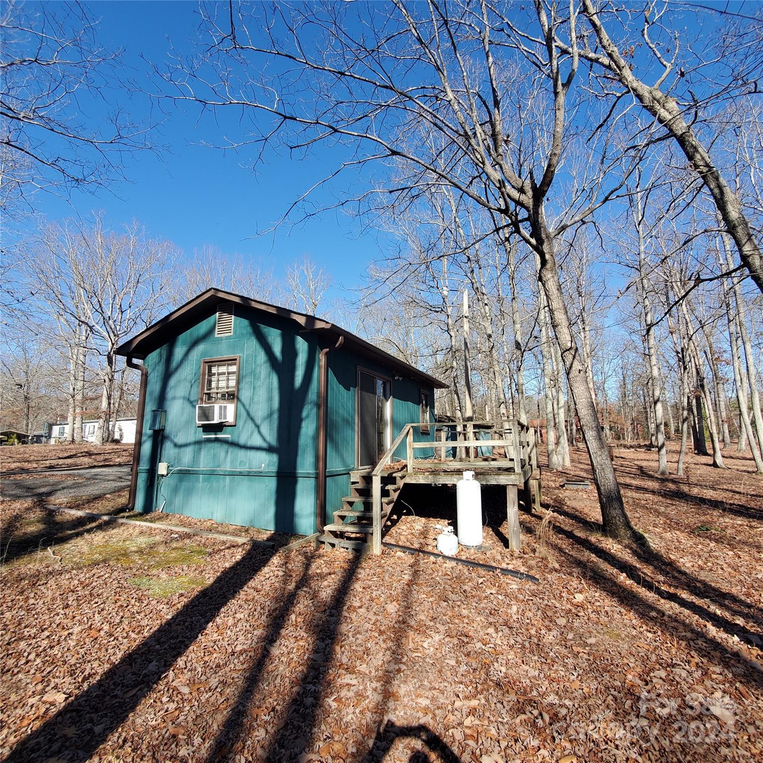 135 Printhad Road Dallas, NC 28034 - Photo 3 of 17 a view of a house with a yard