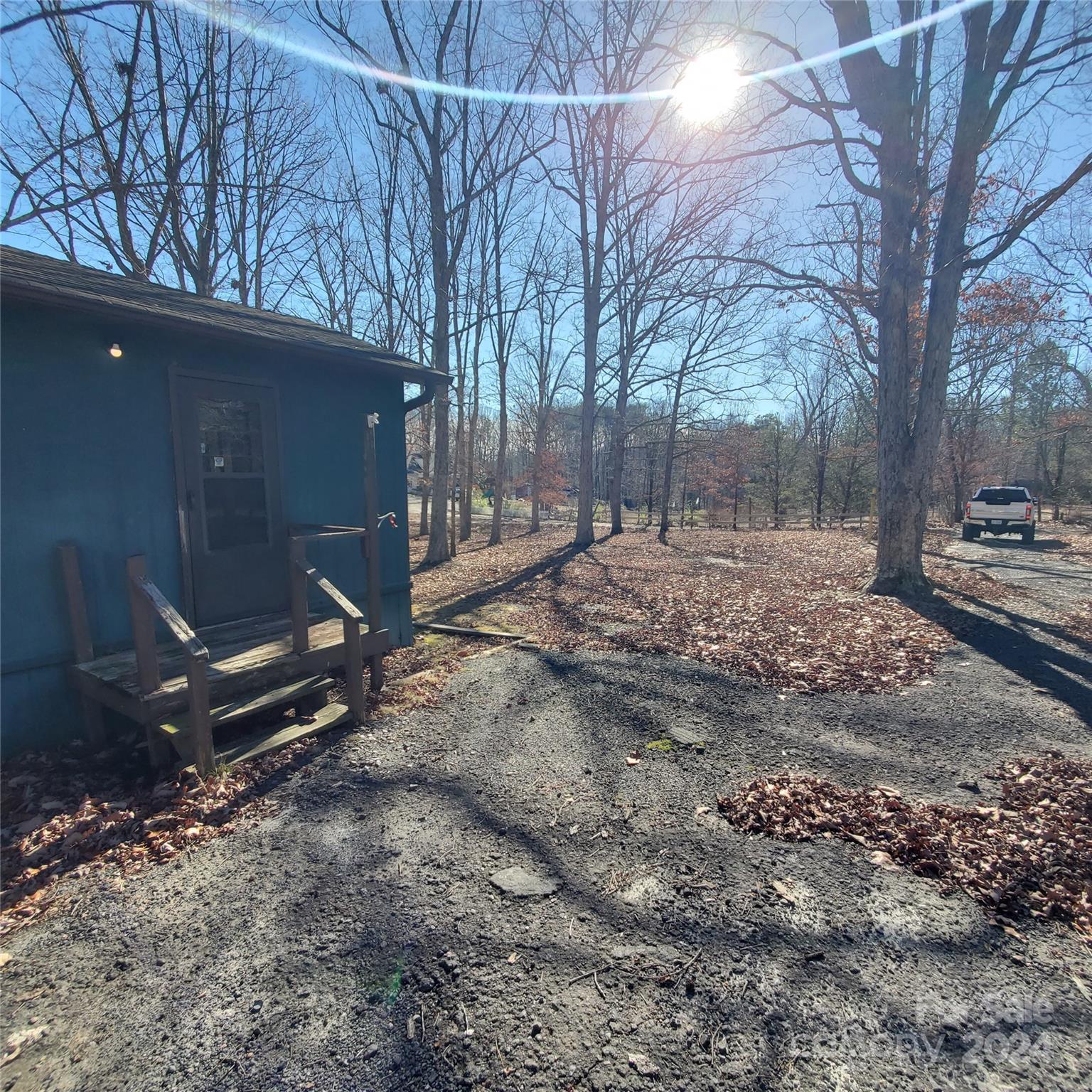 135 Printhad Road Dallas, NC 28034 - Photo 5 of 17 a backyard of a house with lots of green space