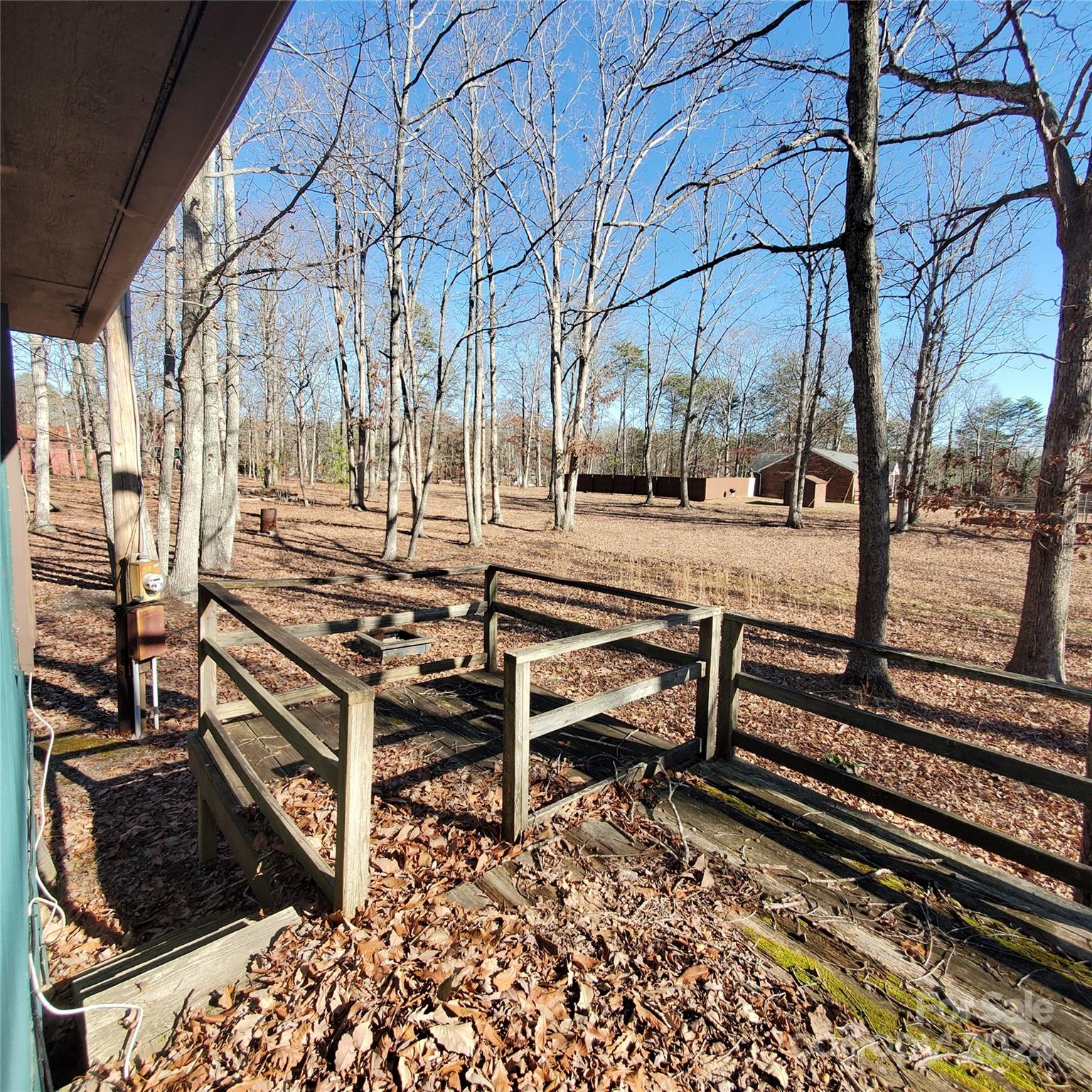 135 Printhad Road Dallas, NC 28034 - Photo 7 of 17 a view of a backyard with sitting area