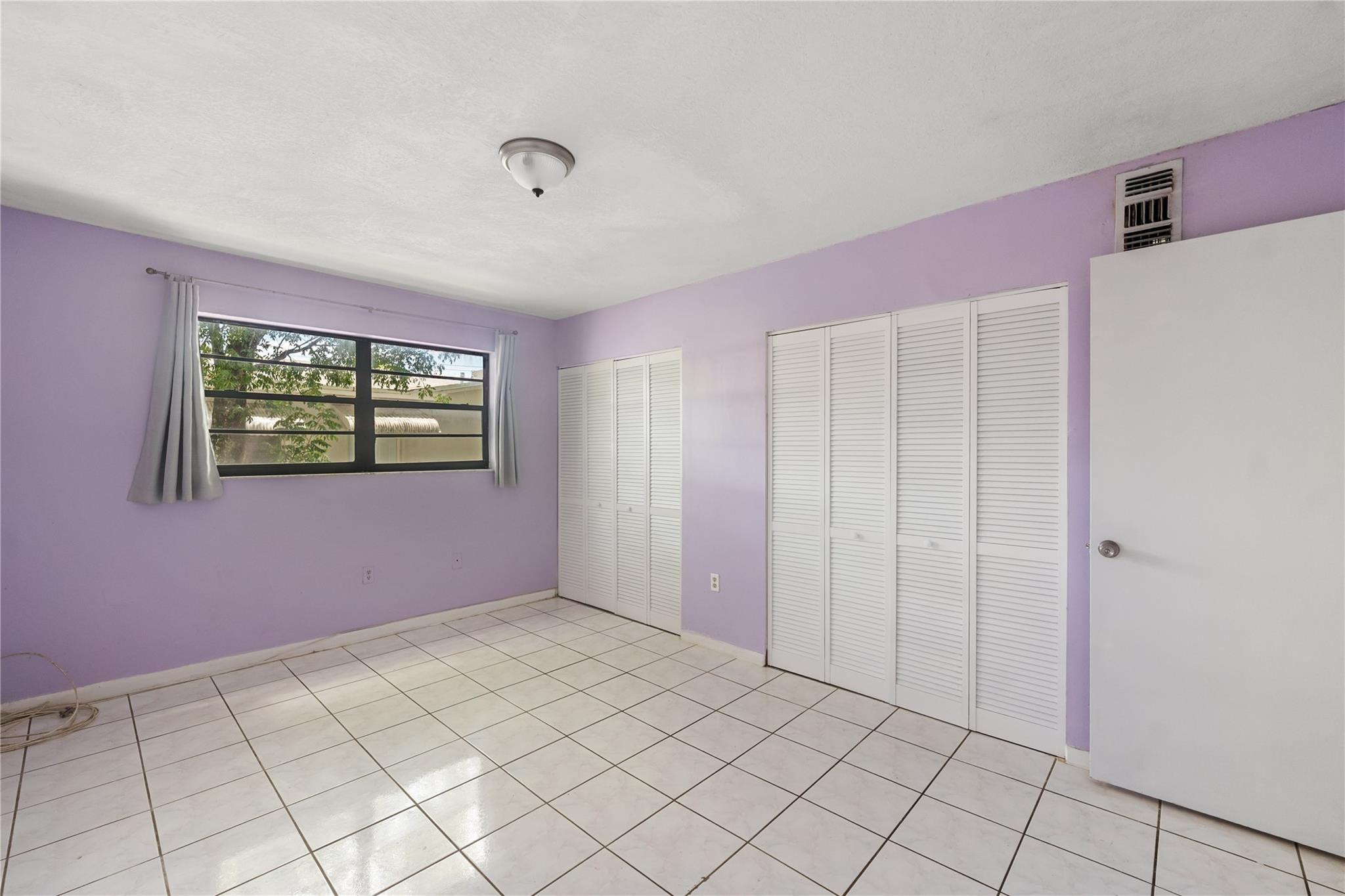 1925 Madison Street, Unit 14 Hollywood, FL 33020 - Photo 7 of 10 a view of an empty room