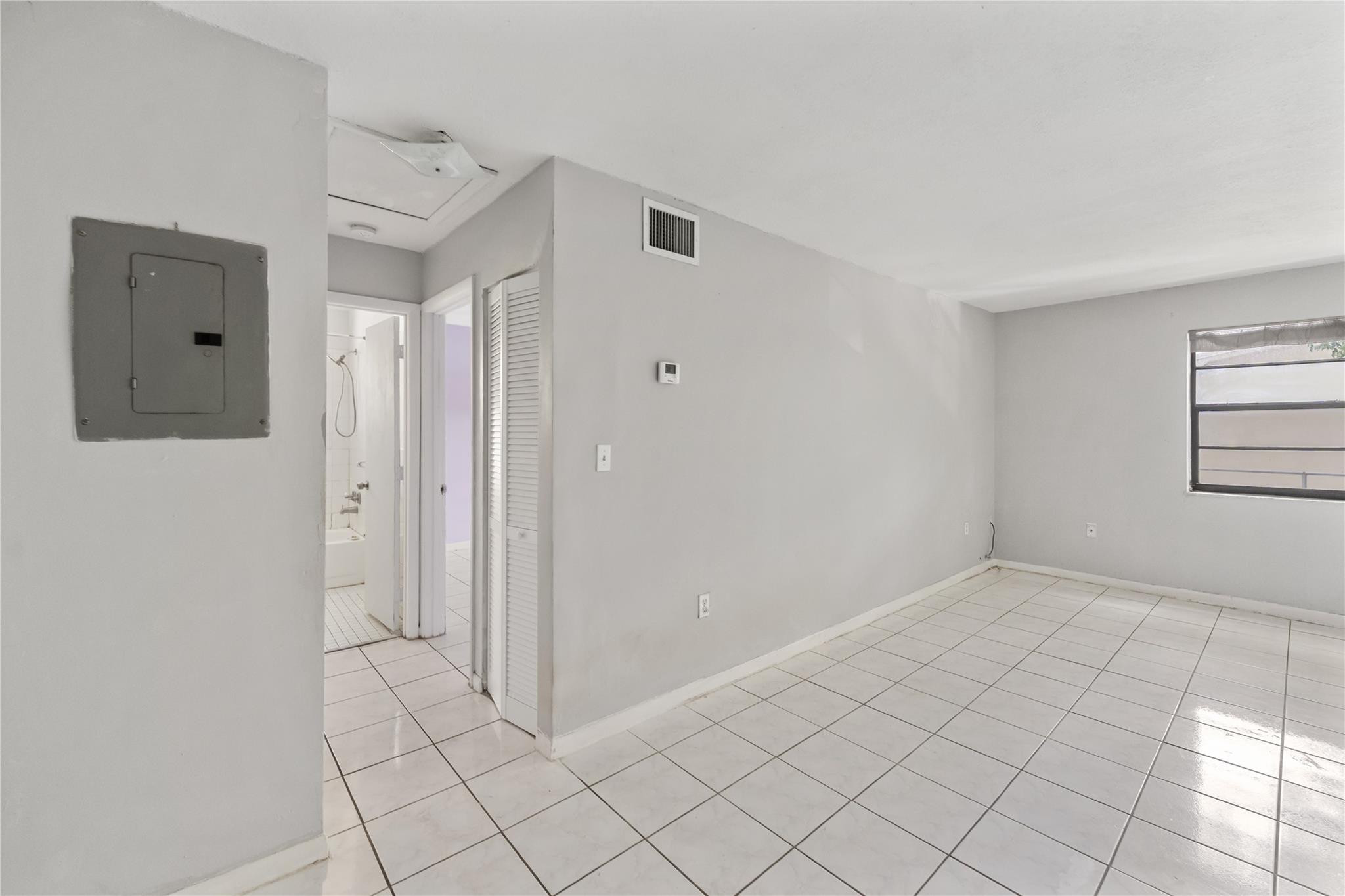 1925 Madison Street, Unit 14 Hollywood, FL 33020 - Photo 9 of 10 a view of an empty room