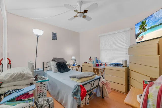a living room with dryer and washer