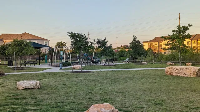 a garden view with a fountain