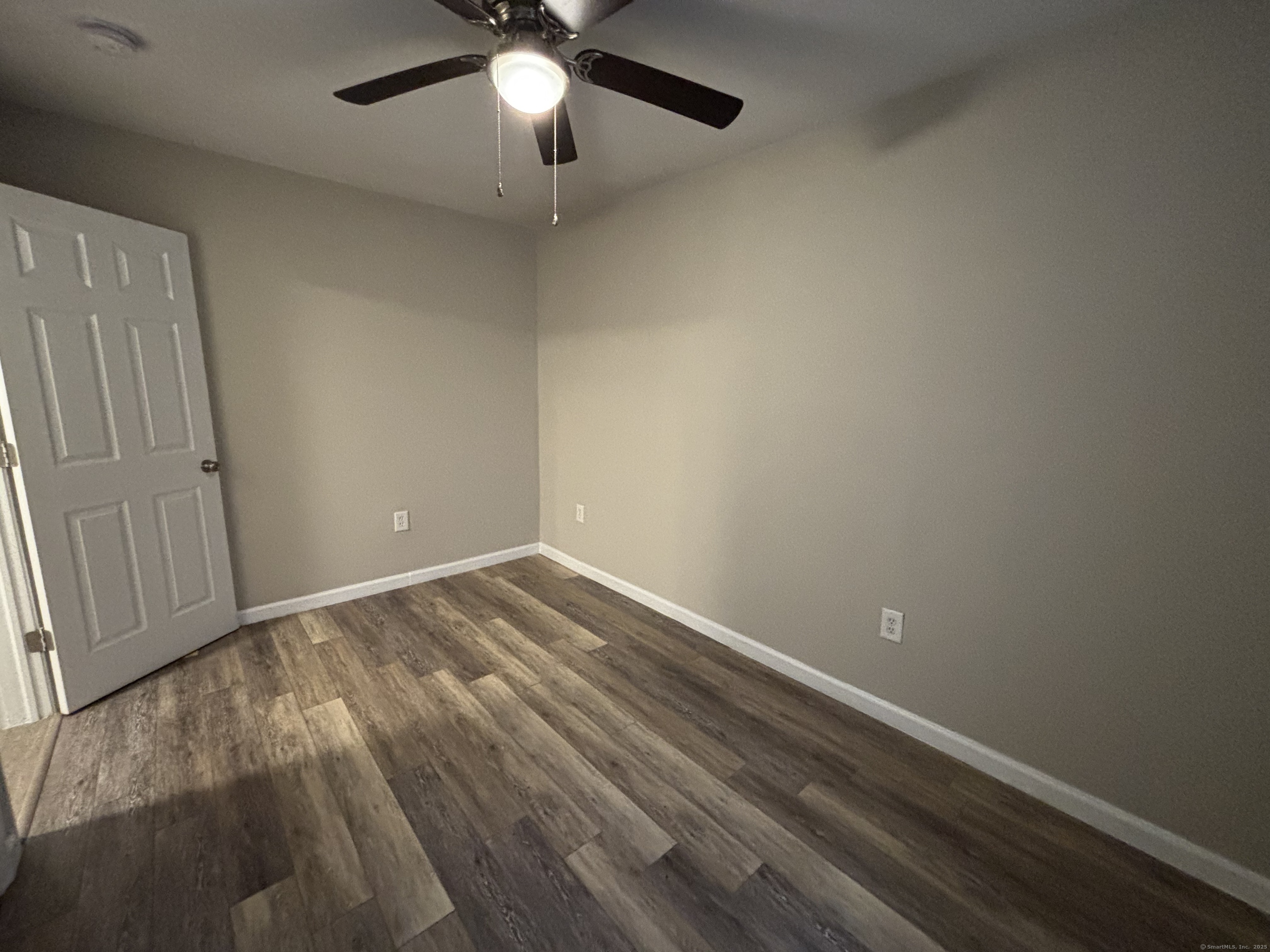 225 Golden Hill Street, Unit 3F Bridgeport, CT 06604 - Photo 11 of 12 an empty room with a ceiling fan