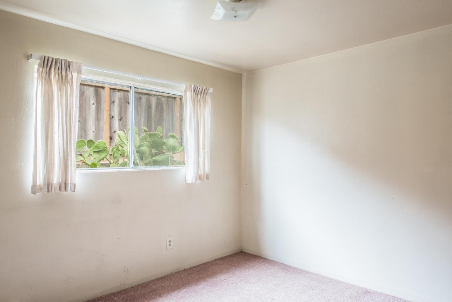 1816 Juarez Street Seaside, CA 93955 - Photo 14 of 27 an empty room with a window