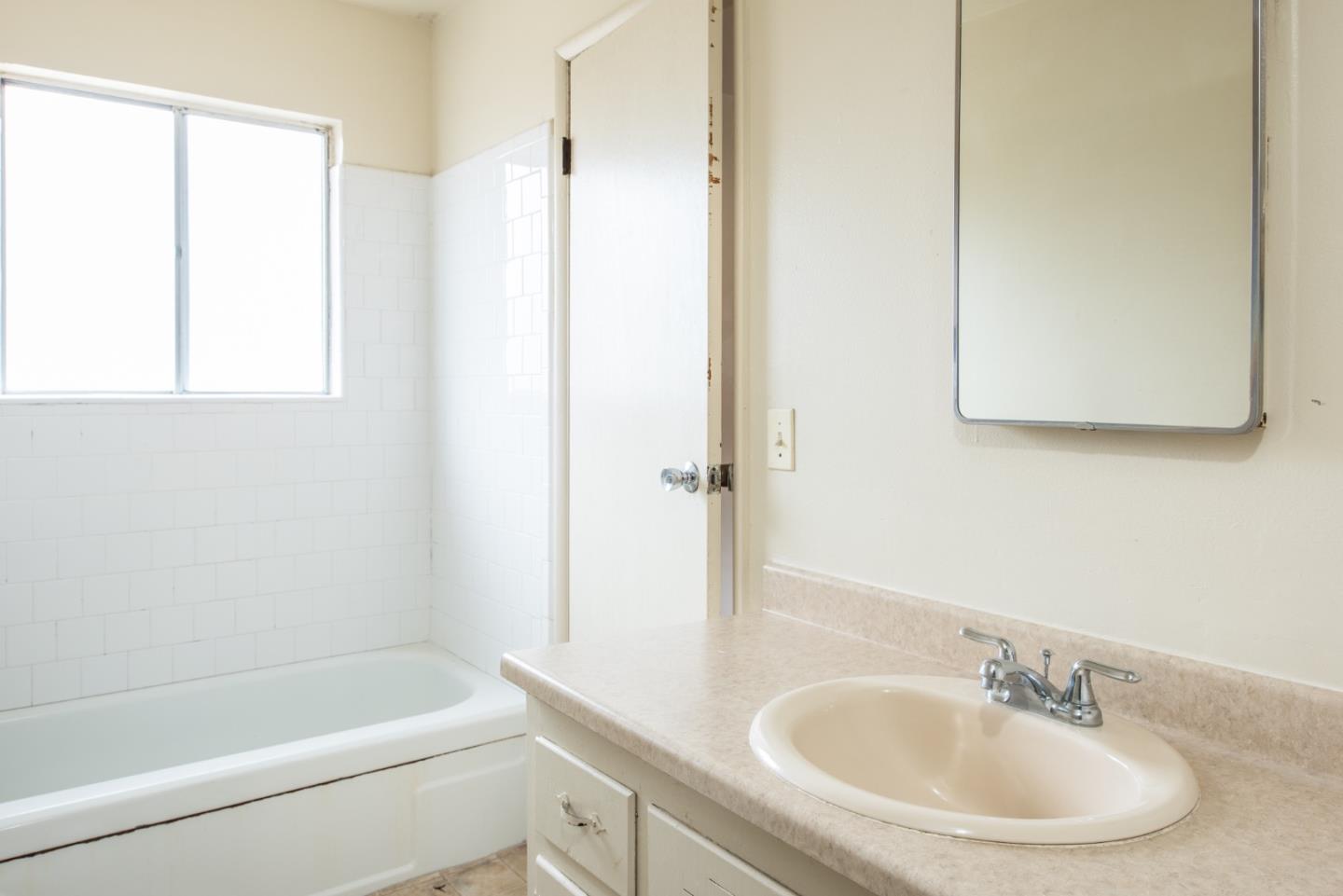 1816 Juarez Street Seaside, CA 93955 - Photo 16 of 27 a bathroom with a sink and a bathtub