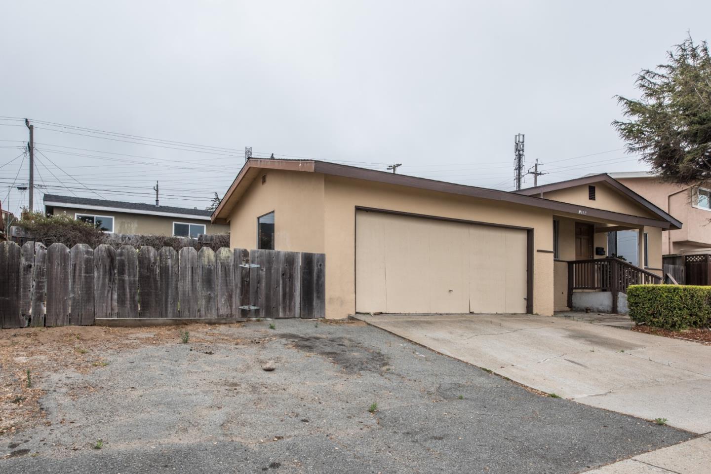 1816 Juarez Street Seaside, CA 93955 - Photo 4 of 27 a view of a house with a garage