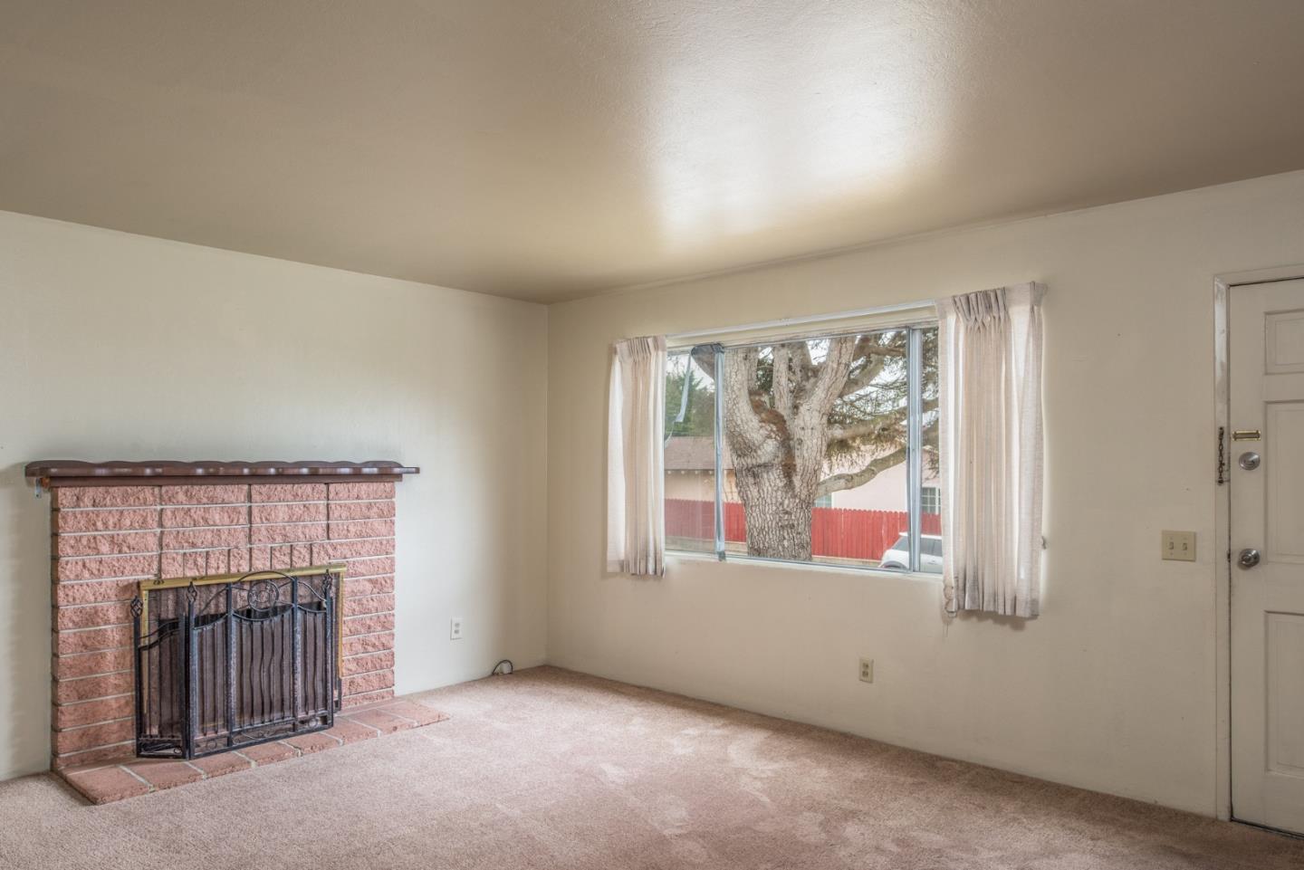 1816 Juarez Street Seaside, CA 93955 - Photo 6 of 27 an empty room with fireplace